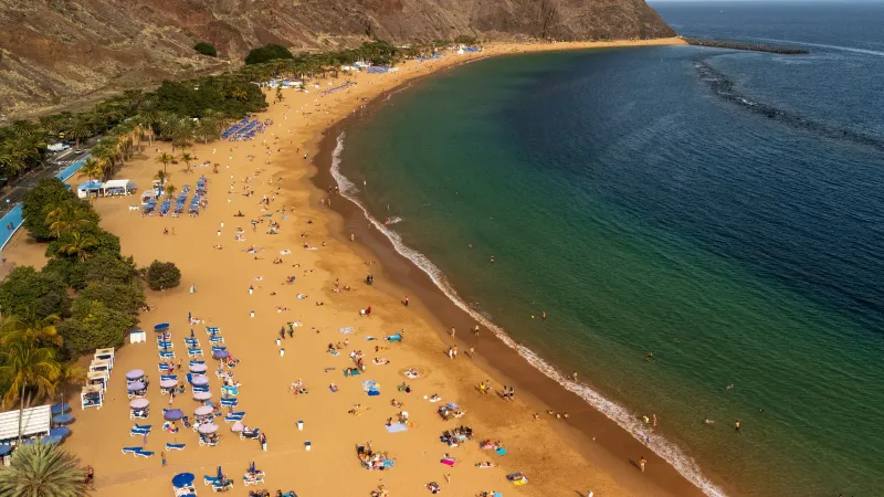 Golden sand and the curved shoreline of Las Teresitas beach, Tenerife