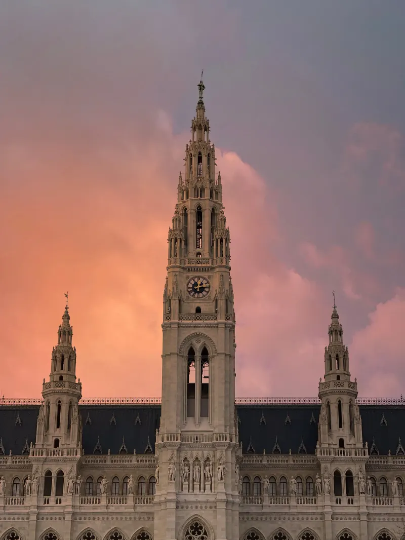 Vienna’s Rathaus tower against a warm evening sky