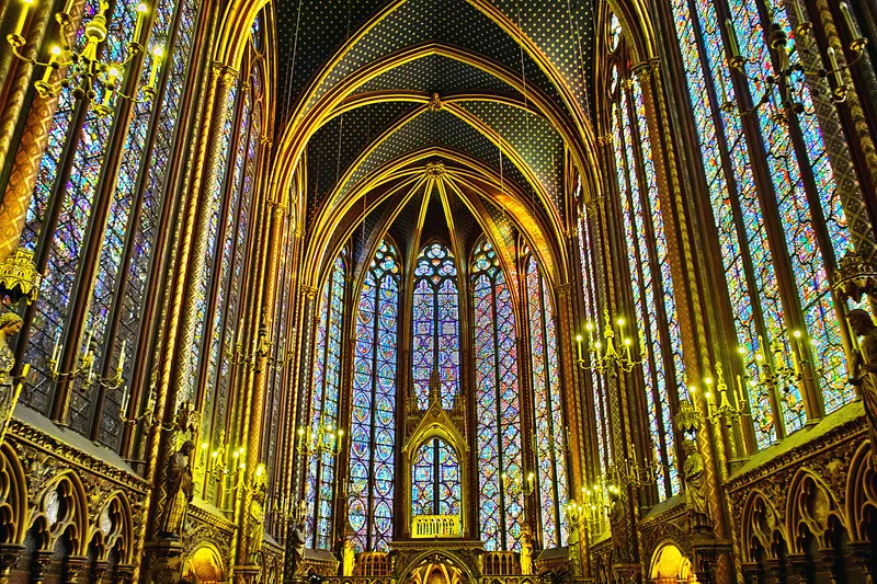 The stained-glass windows and gilded vaults of Sainte-Chapelle, Paris; historic interior photograph